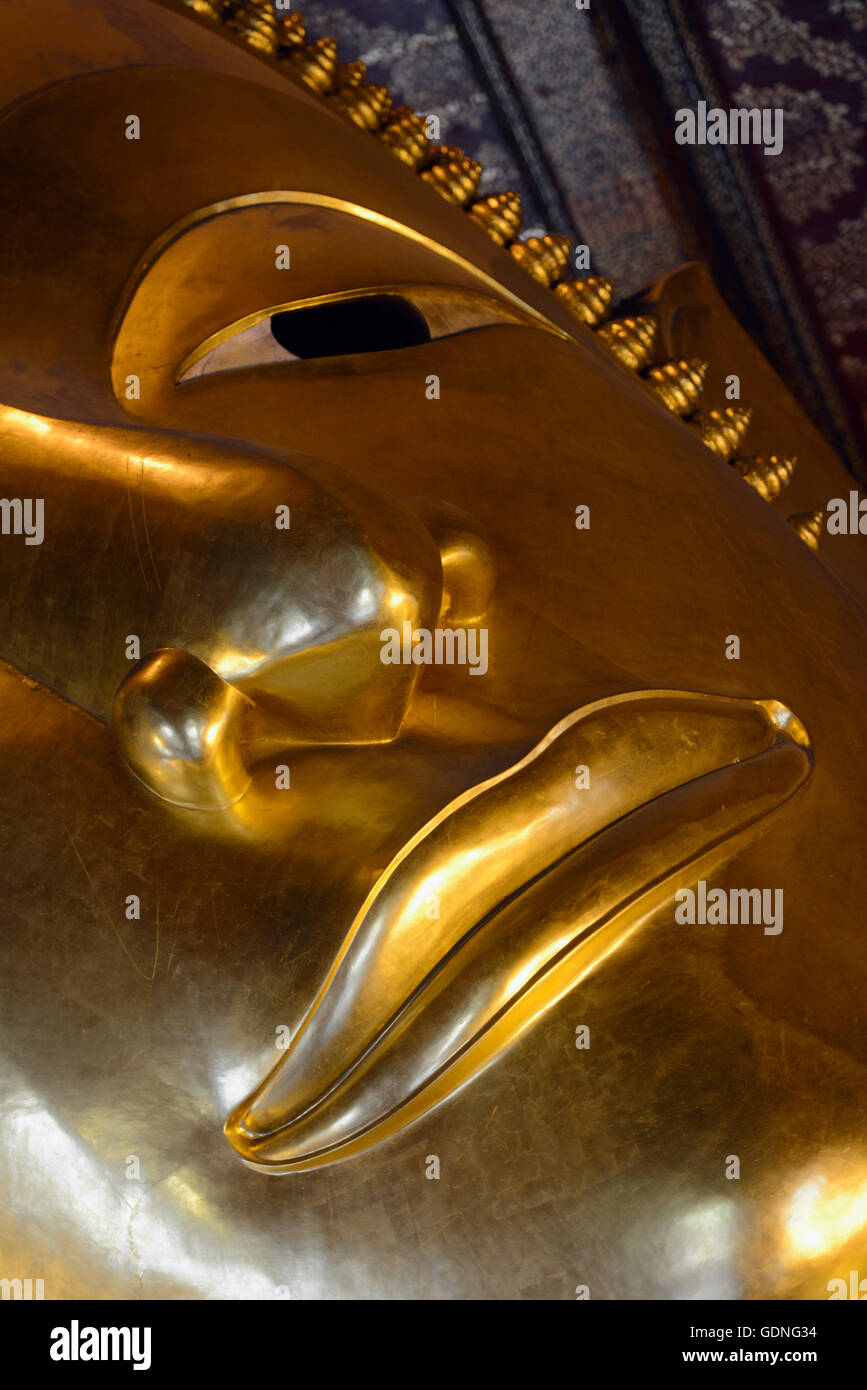The golden Buddha at the temple of Wat Pho in the city of Bangkok in ...