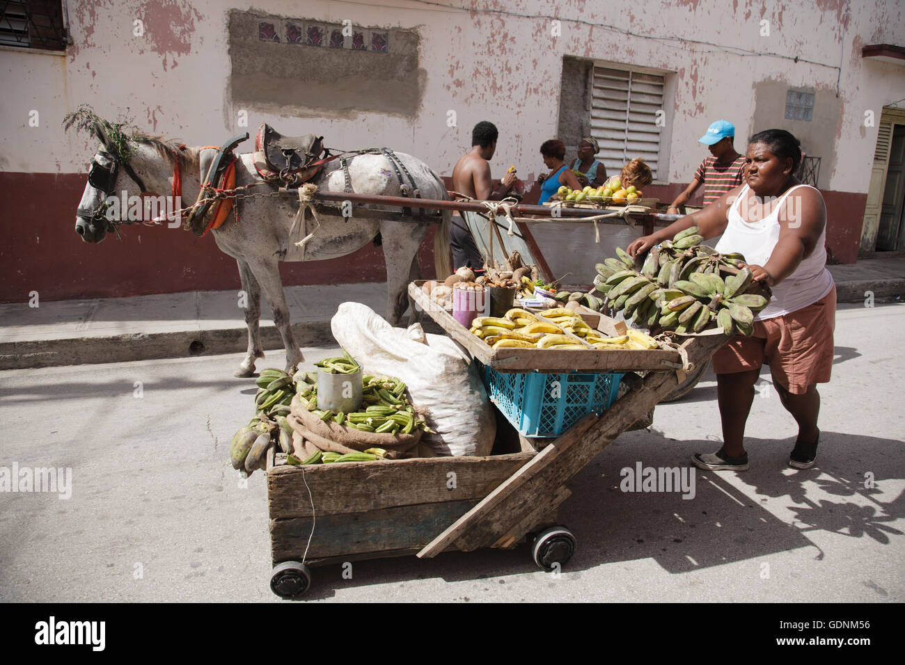 Street vendors selling fruit from carts in Santiago de Cuba, Cuba Stock Photo