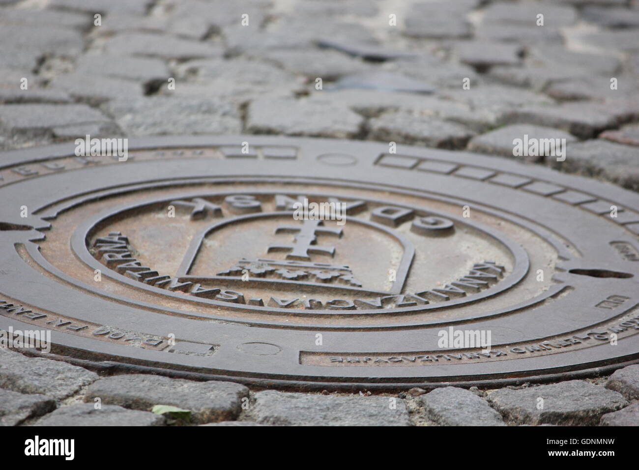 Decorative, manhole covers, gdansk, polen, cobblestone Stock Photo