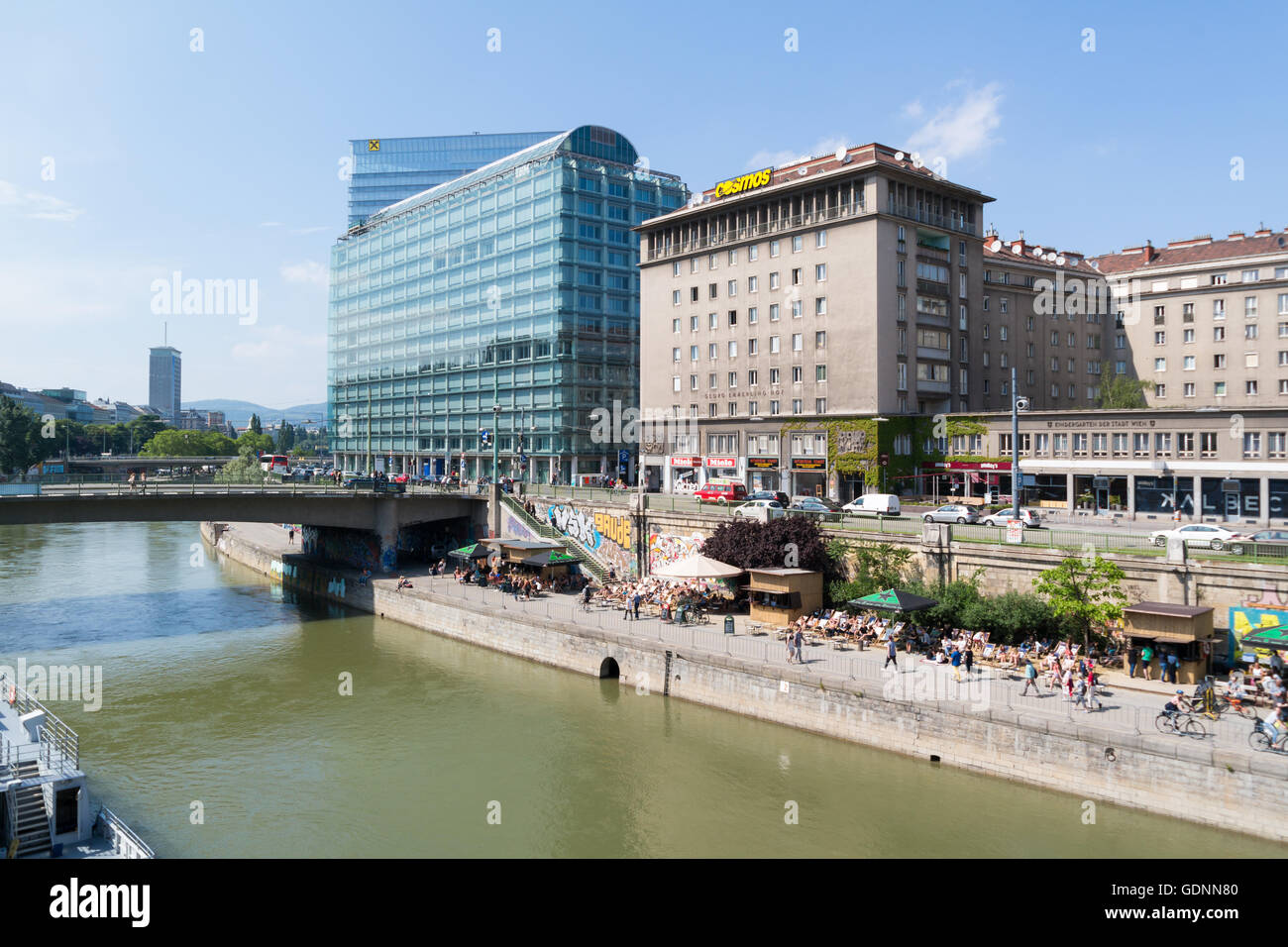 Highrise and waterfront promenade of Little Danube canal in city of Vienna, Austria Stock Photo