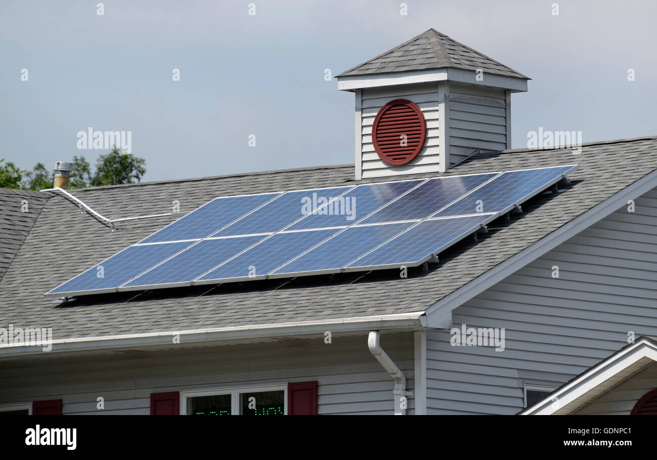 Solar panels on roof of a building, northern NJ Stock Photo