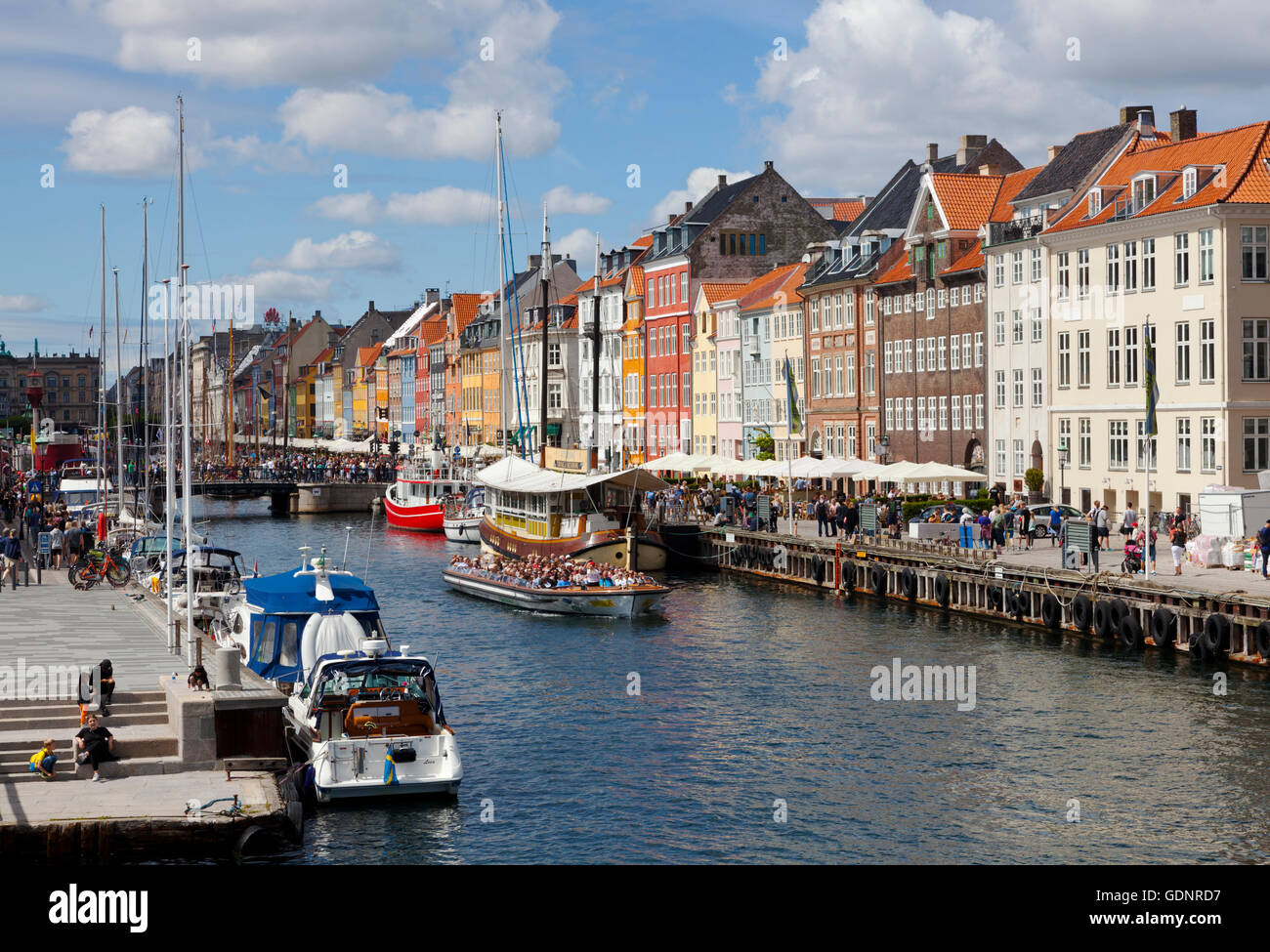 The waterway entrance and view into the Nyhavn canal in Copenhagen harbour. Stock Photo