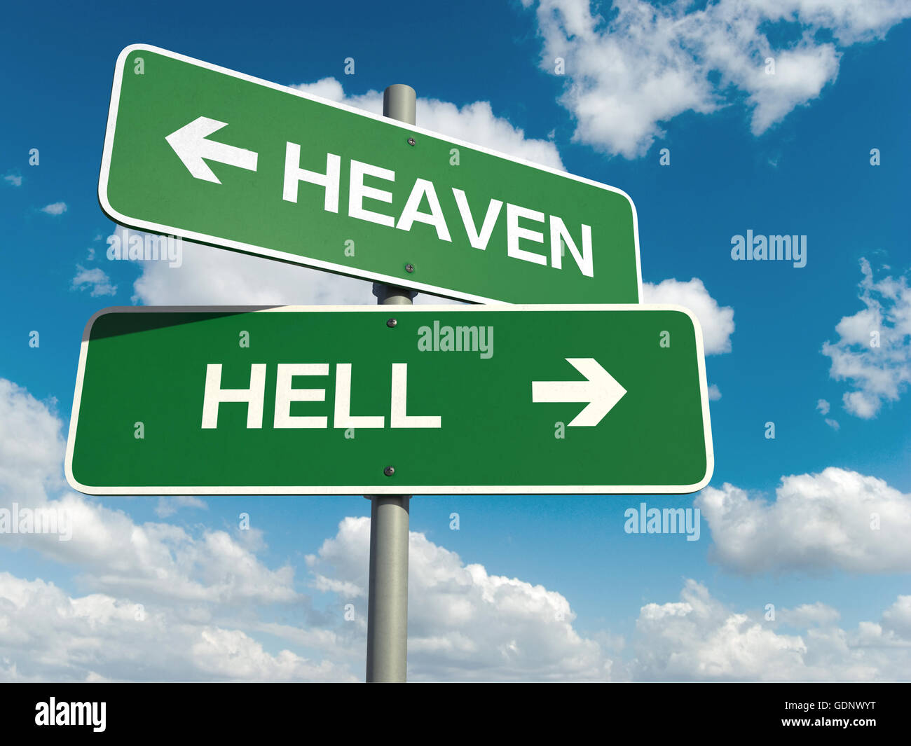 A road sign with heaven hell words on sky background Stock Photo