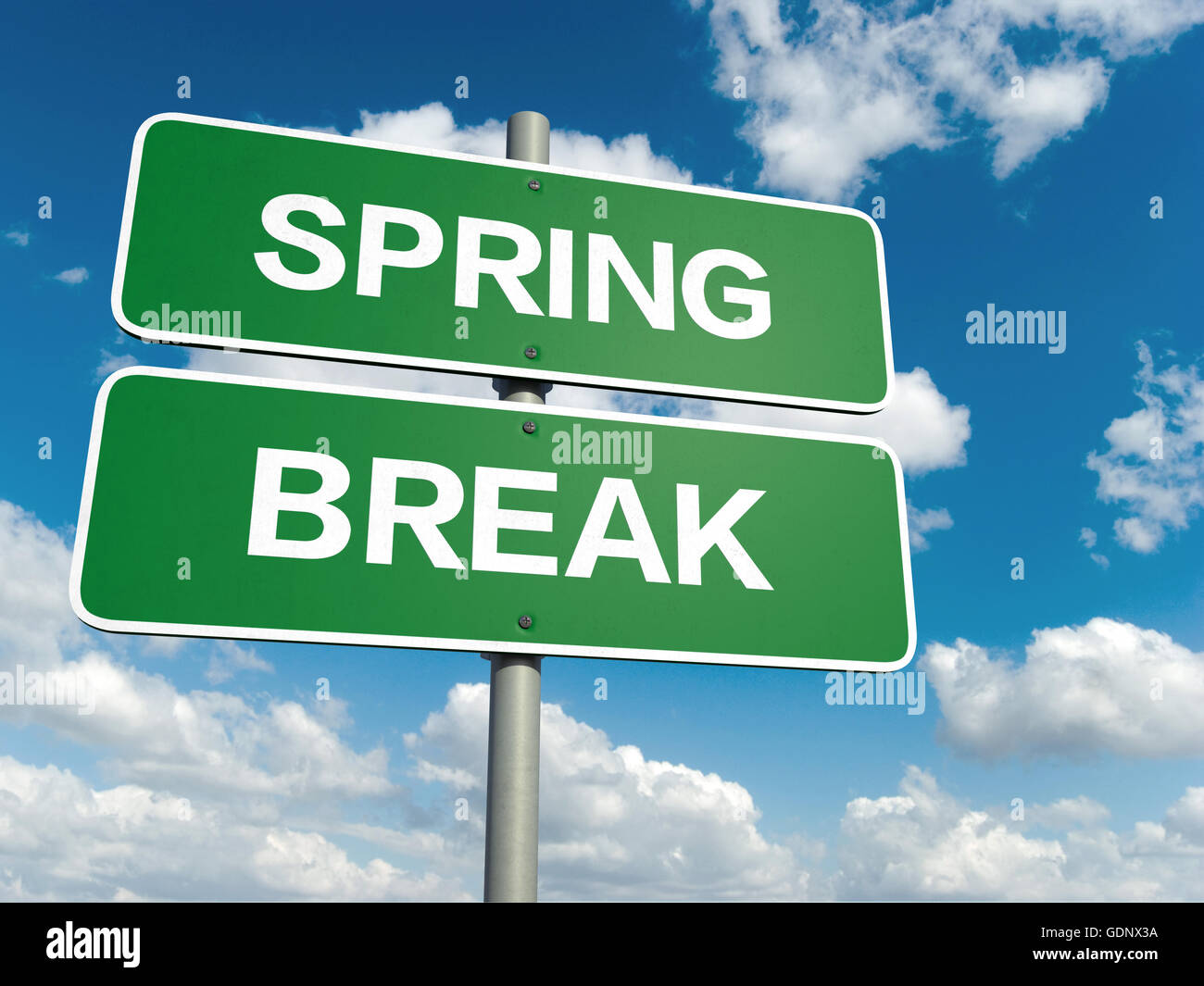A road sign with spring break words on sky background Stock Photo