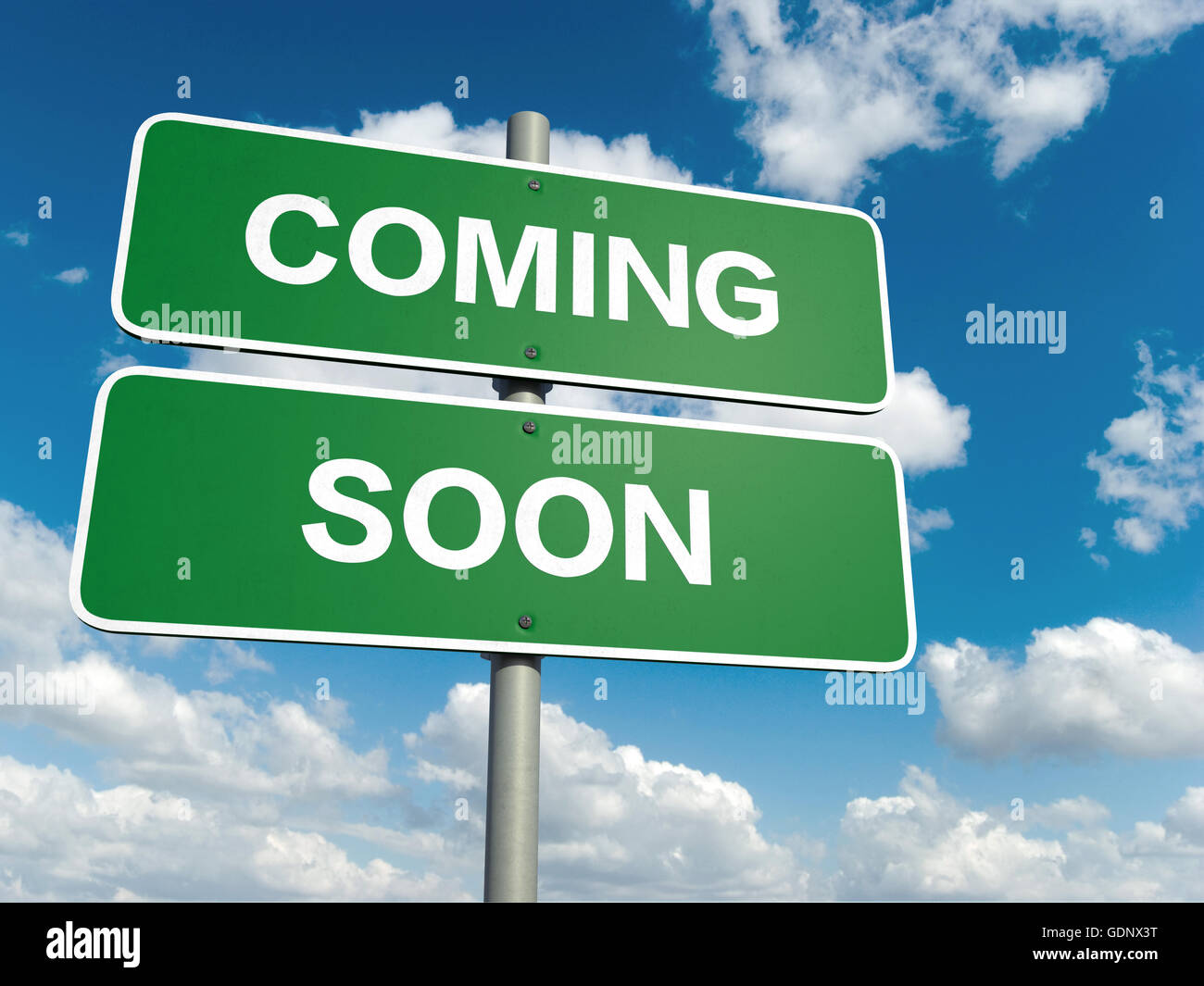 A road sign with coming soon words on sky background Stock Photo