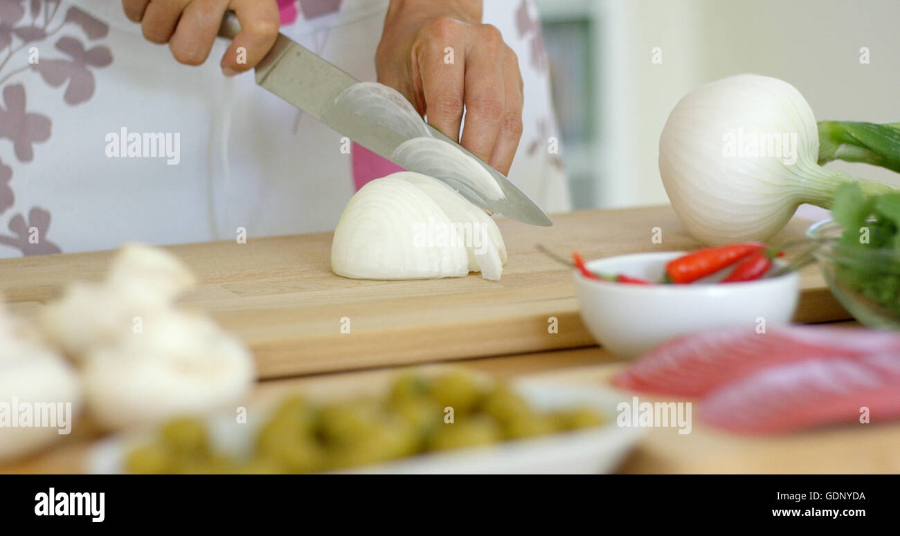 Close up hands cut onion hi-res stock photography and images - Alamy
