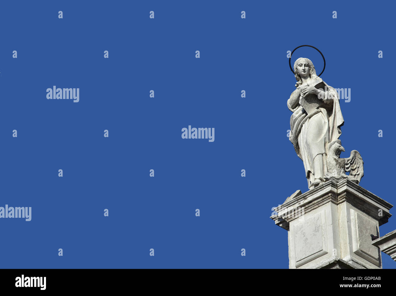 Statue of John the Evangelist and Apostle from baroque facade o Santa ...