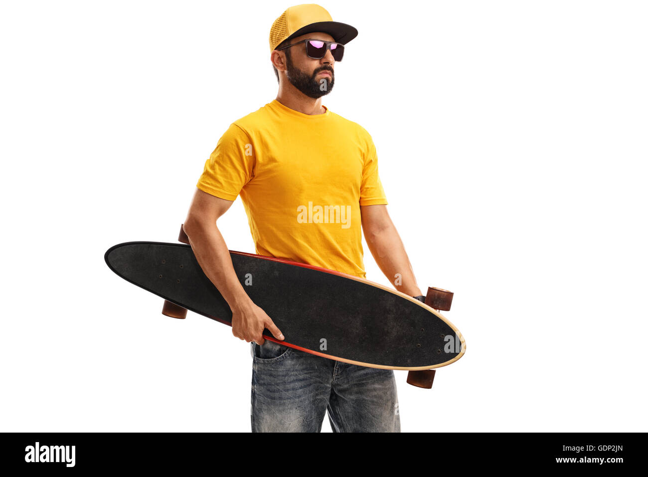 Studio shot of a skater guy holding a longboard isolated on white background Stock Photo Alamy
