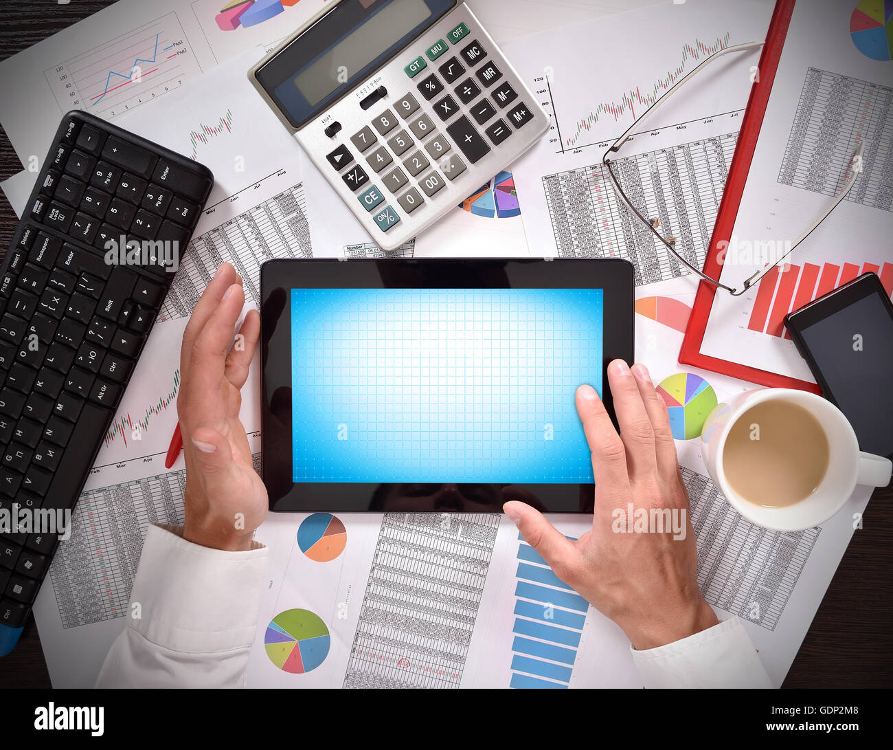 hands using digital tablet with blank screen Stock Photo - Alamy