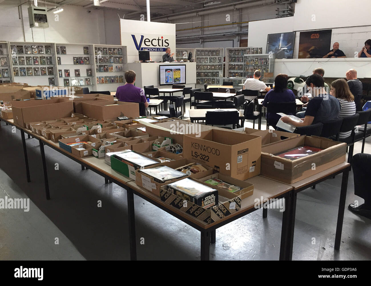 People attend the auction of a large private collection of 700 Star Wars items which are expected to bring in around £500,000 when they go under the hammer at Vectis Auctions in Thornaby, Teesside. Stock Photo