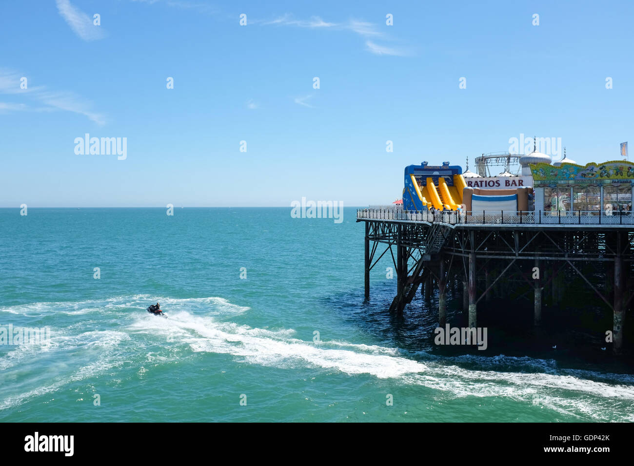 A Jet Ski just off Brighton's Palace Pier on the south coast of England. Stock Photo