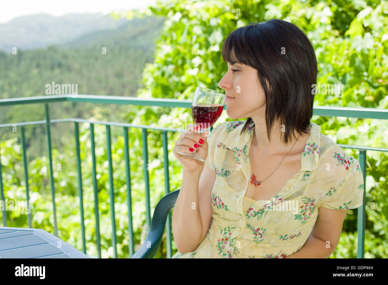 woman drinking red wine in a vineyard, outdoor Stock Photo - Alamy