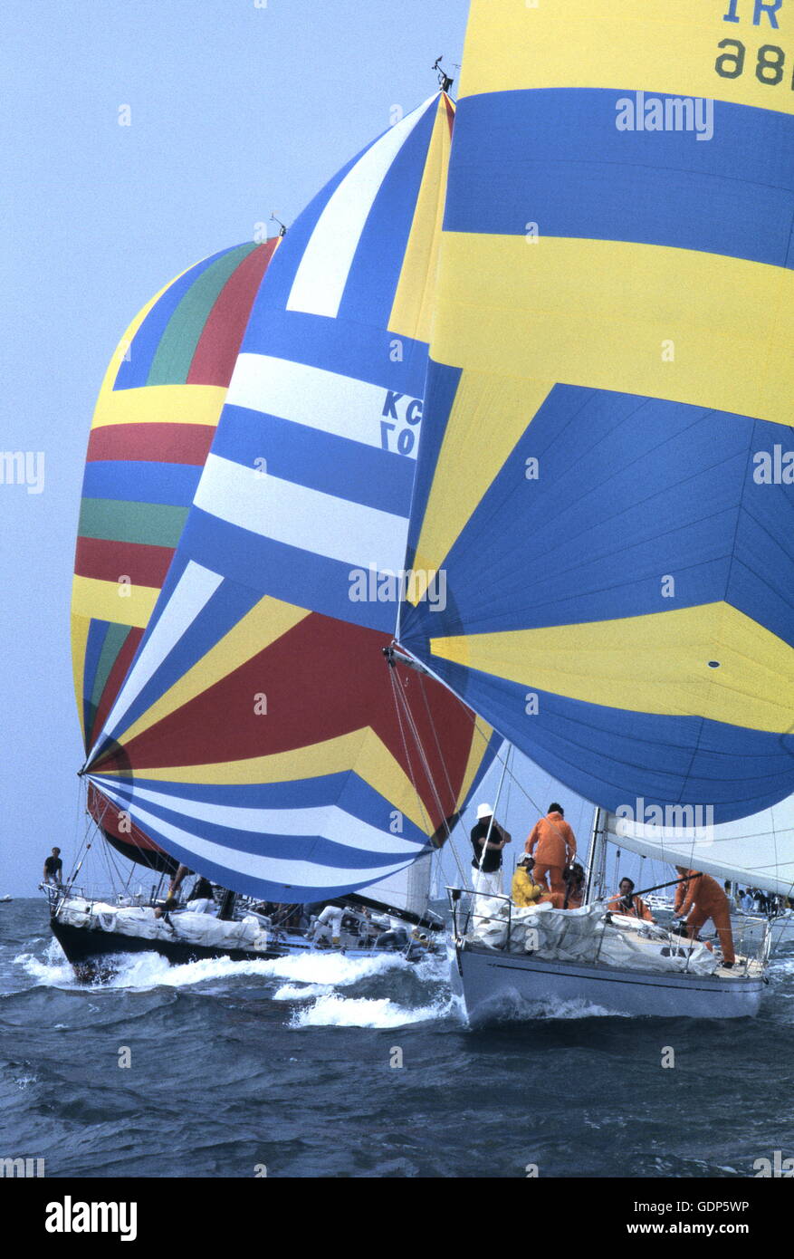 AJAXNETPHOTO. 3RD AUGUST 1979. COWES, ENGLAND. - CHANNEL RACE STARTERS - ADMIRAL'S CUP COMPETITORS (L-R) NAUTICUS (PL), MAGISTRI (CAN) AND INISHANIER (IR) ON SPINNAKER START. PHOTO:JONATHAN EASTLAND/AJAX  REF:905648 41 Stock Photo
