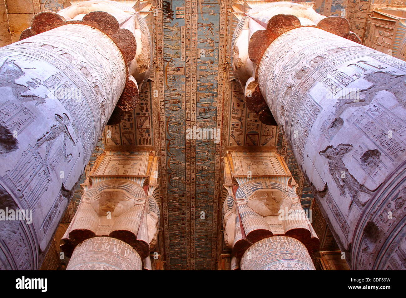 The huge pillars and beautiful ceiling inside Dendera temple dedicated to Hathor goddess, Egypt Stock Photo