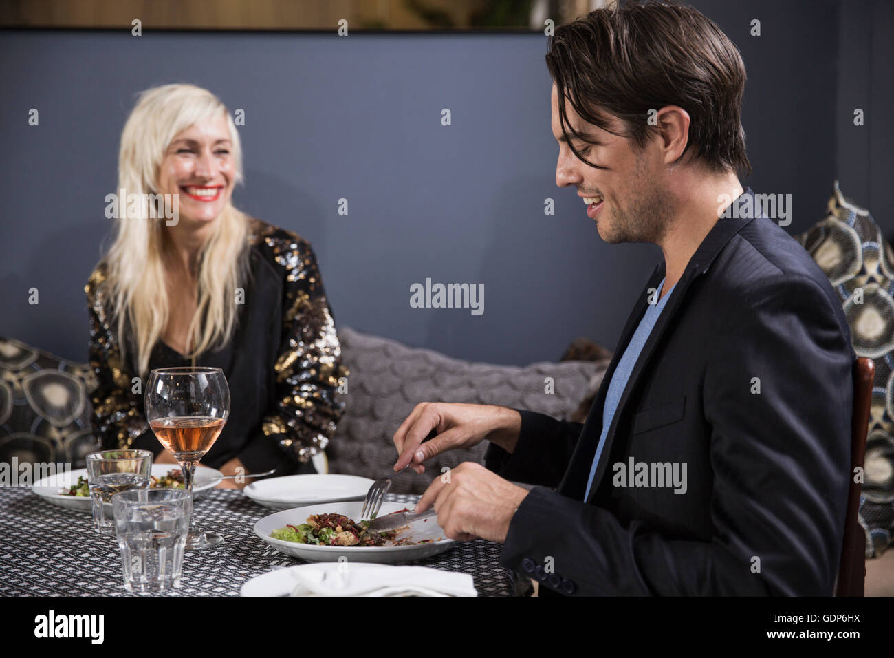 Couple on date dining in restaurant Stock Photo