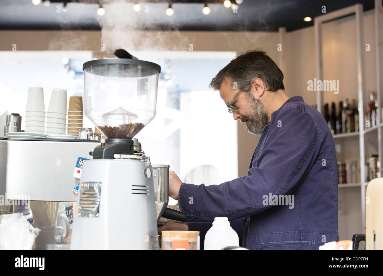 Cafe owner coffee hires stock photography and images Alamy