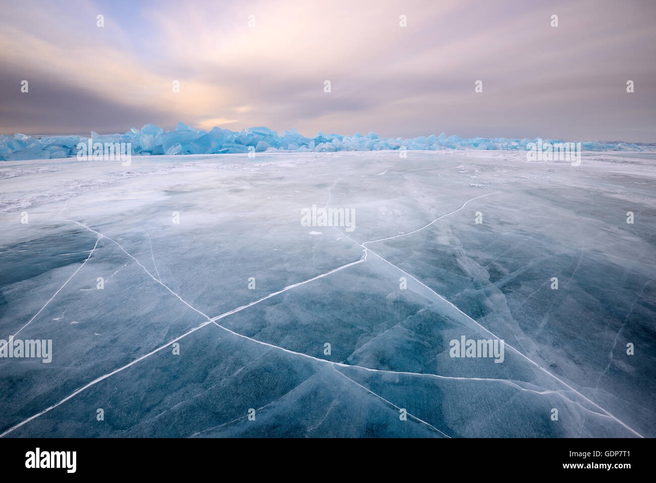 Cracked patterned ice, Baikal Lake, Olkhon Island, Siberia, Russia Stock Photo