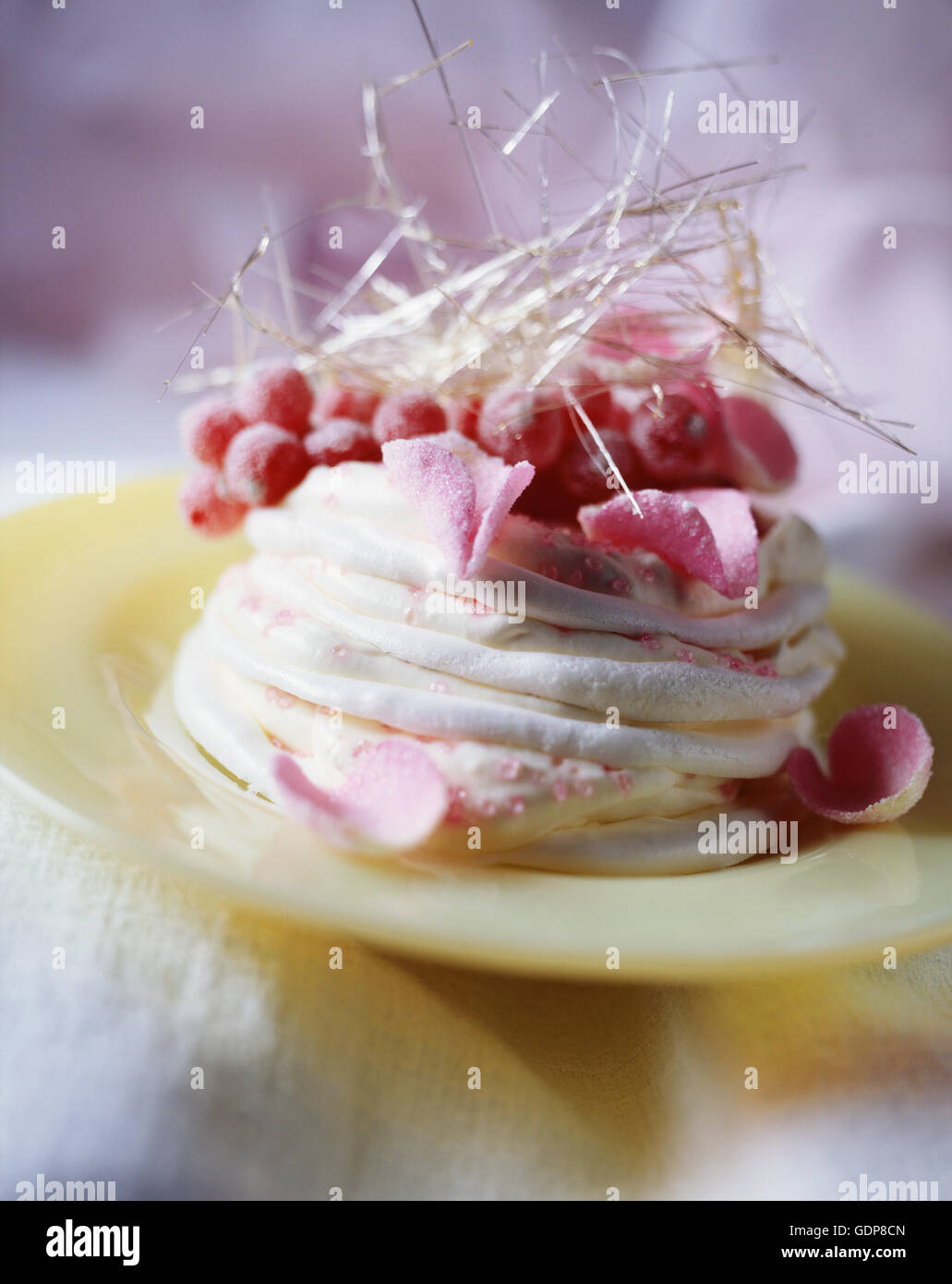 Berry and rose petal meringue with cream, closeup Stock Photo Alamy