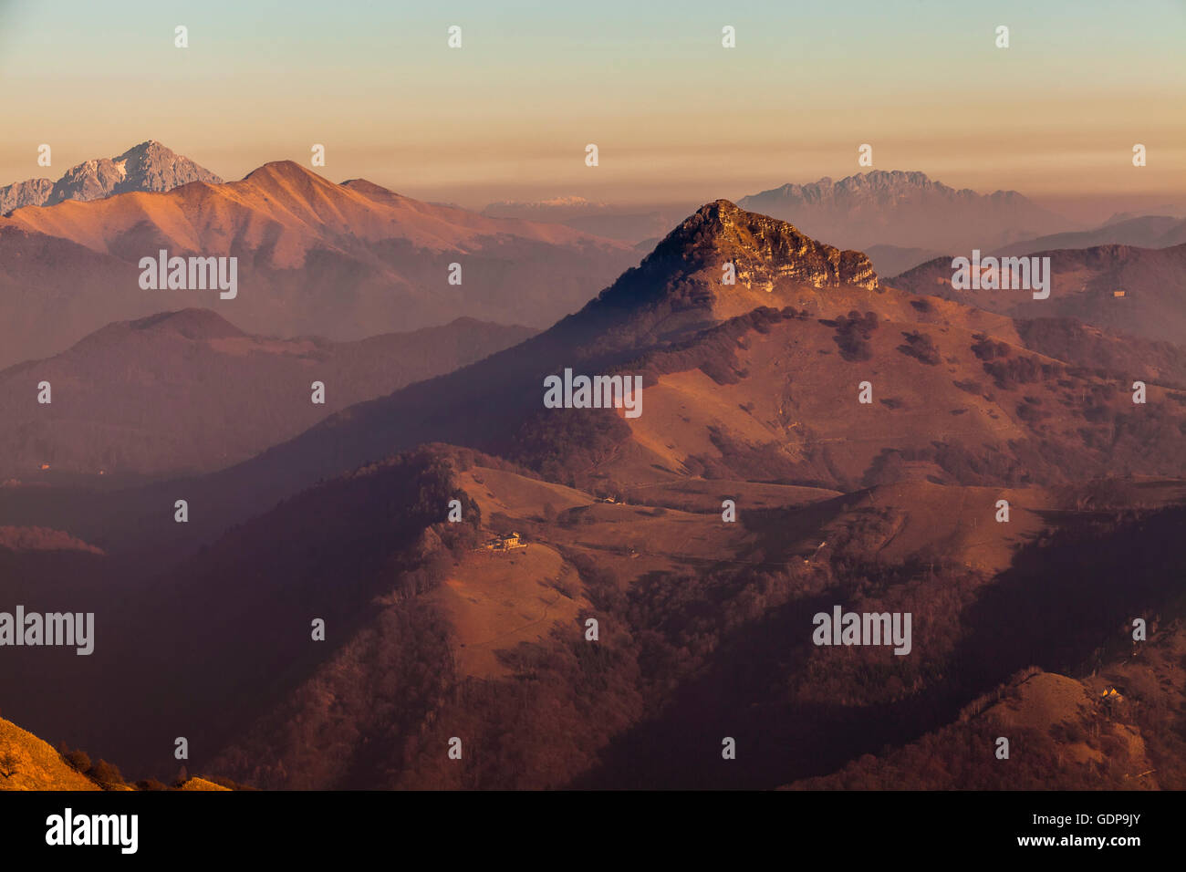 Elevated view of mountains at dusk, Monte Generoso,Ticino, Switzerland Stock Photo