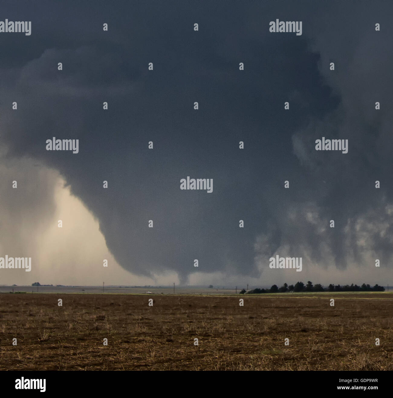 A gigantic wall cloud spins over, Dodge City, Kansas, USA Stock Photo