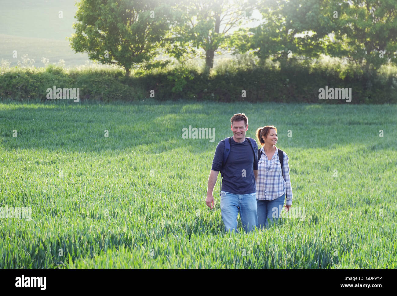 Couple in field Stock Photo