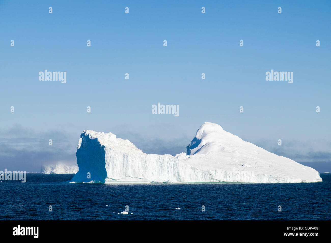 Large Iceberg Floating Out Into Cold Ocean Sea From Ilulissat Icefjord 