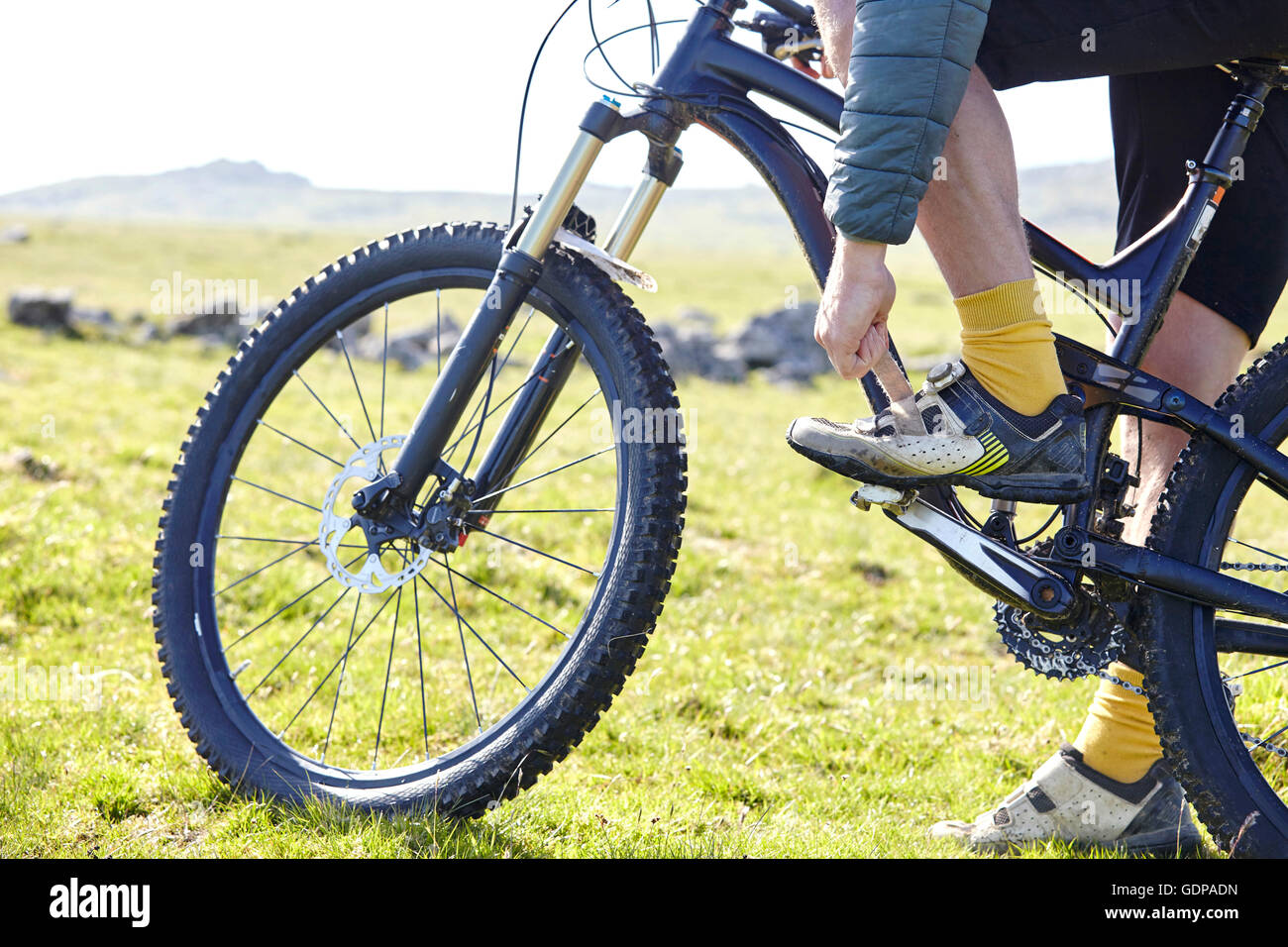 Cropped view of cyclists legs on bicycle Stock Photo