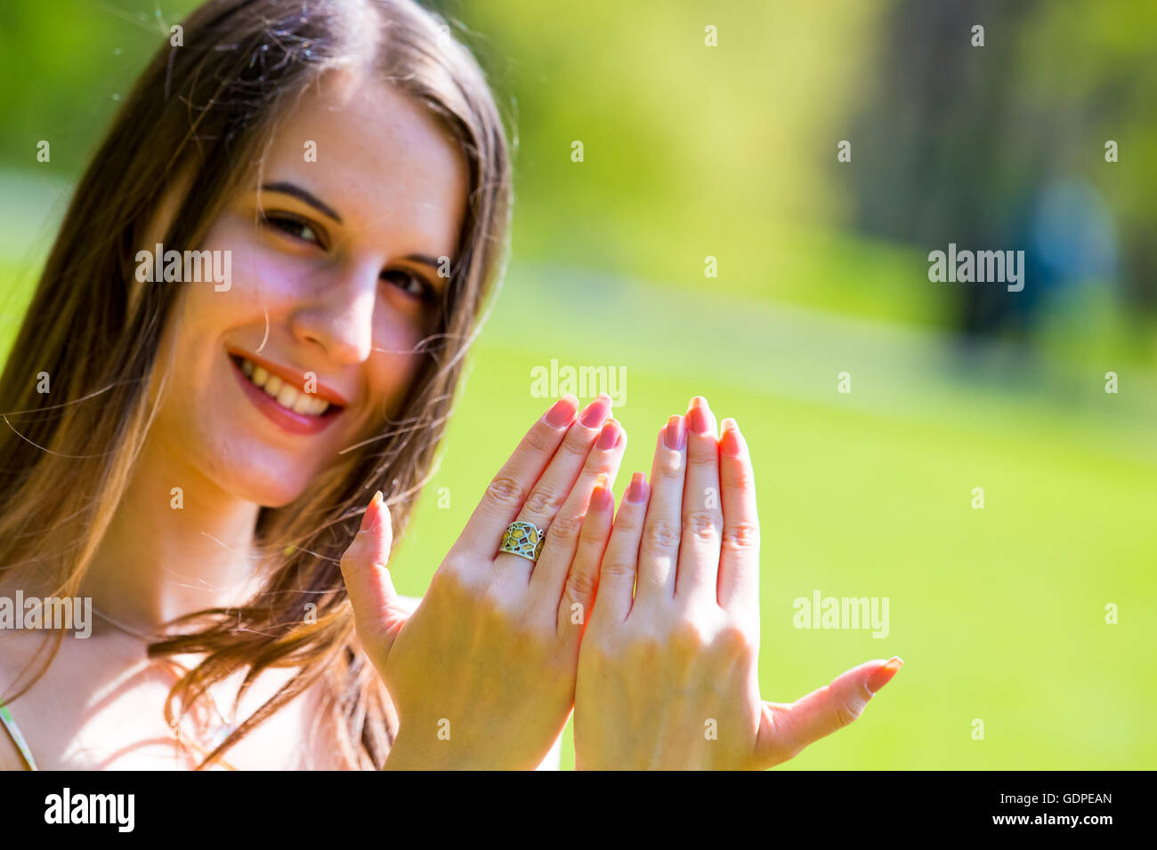 girl shows fingernails Stock Photo