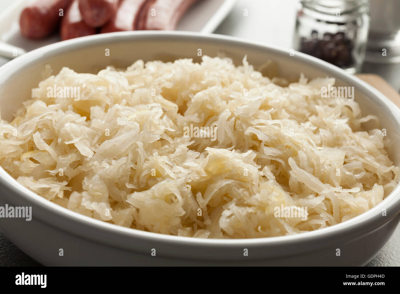 Bowl with raw preserved sauerkraut ready to cook Stock Photo Alamy