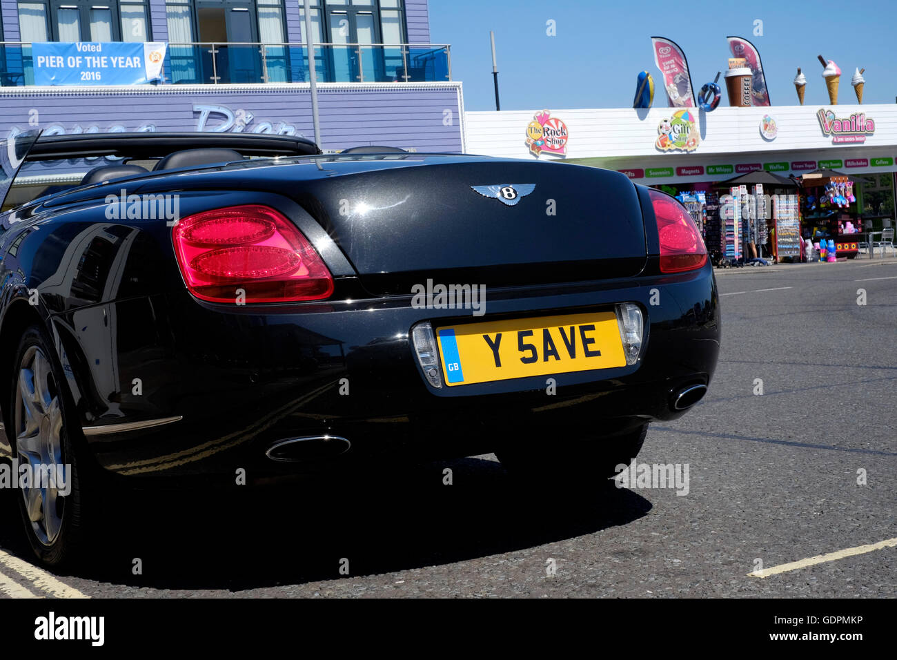 a parked bentley convertible car with private number plate reading y save  england uk Stock Photo - Alamy