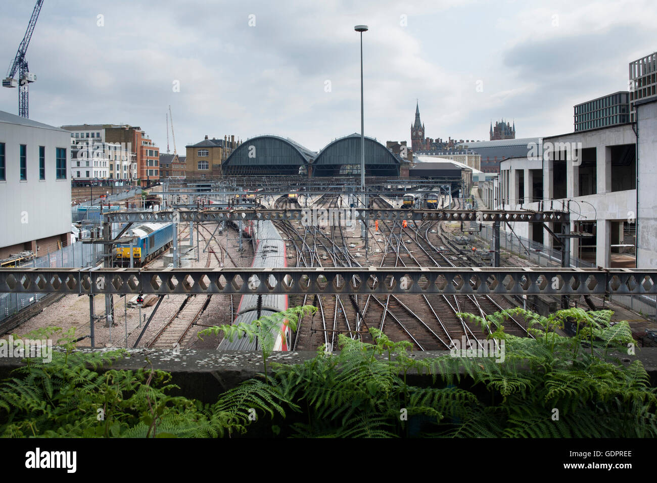 View from Goods Way Bridge to the platforms 1-11 at King's Cross Mainline Station in London, England with St Pancras visible. Stock Photo