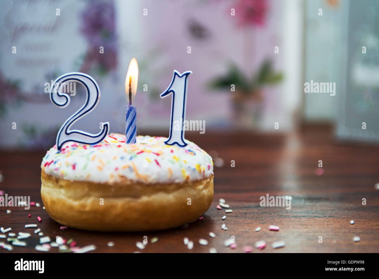 Single birthday donut and candle Stock Photo