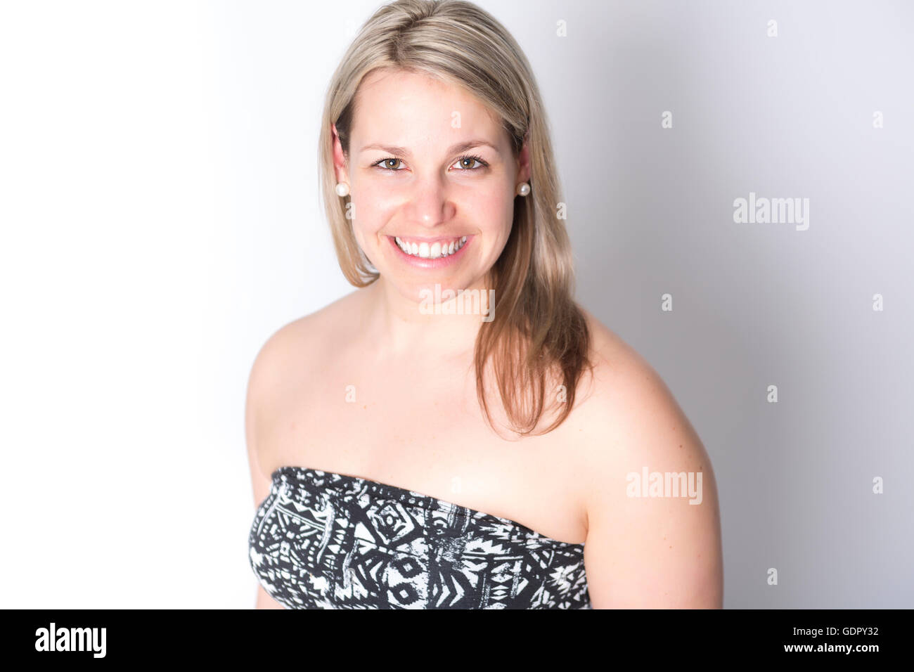 Woman portrait over gray background Stock Photo - Alamy