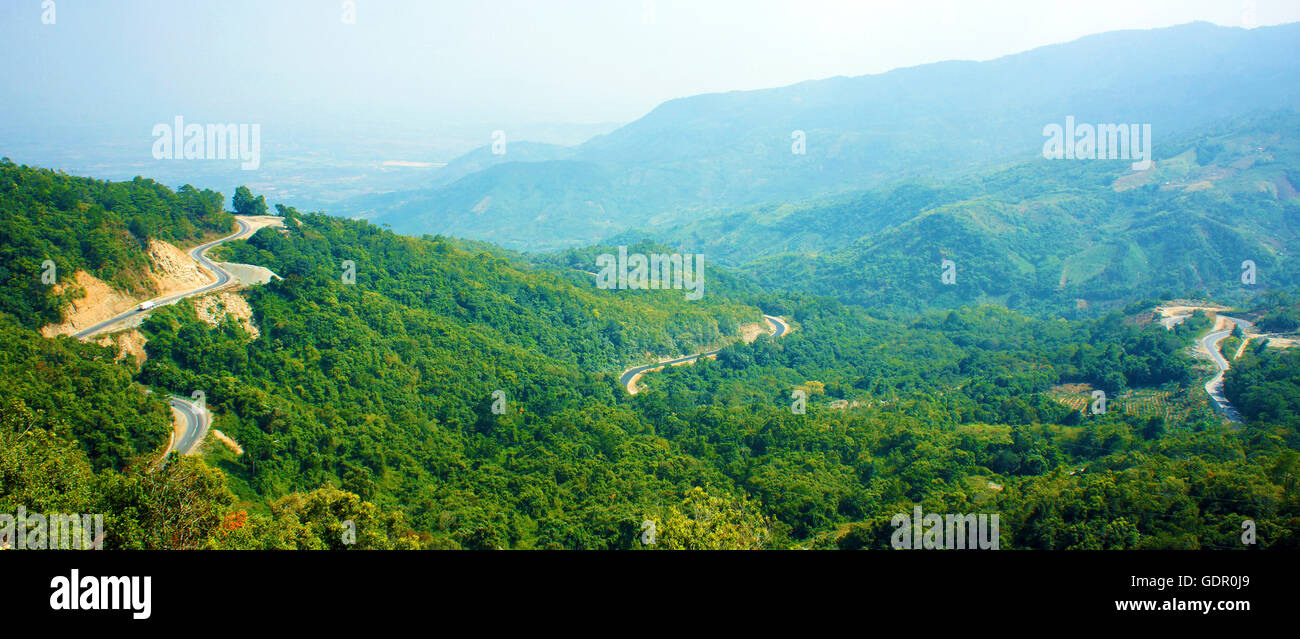 Wonderful scene of nature, Ngoan Muc mountain pass, zigzag, danger, nice with mountain, green forest, road connect Dalat, Phan Rang Stock Photo