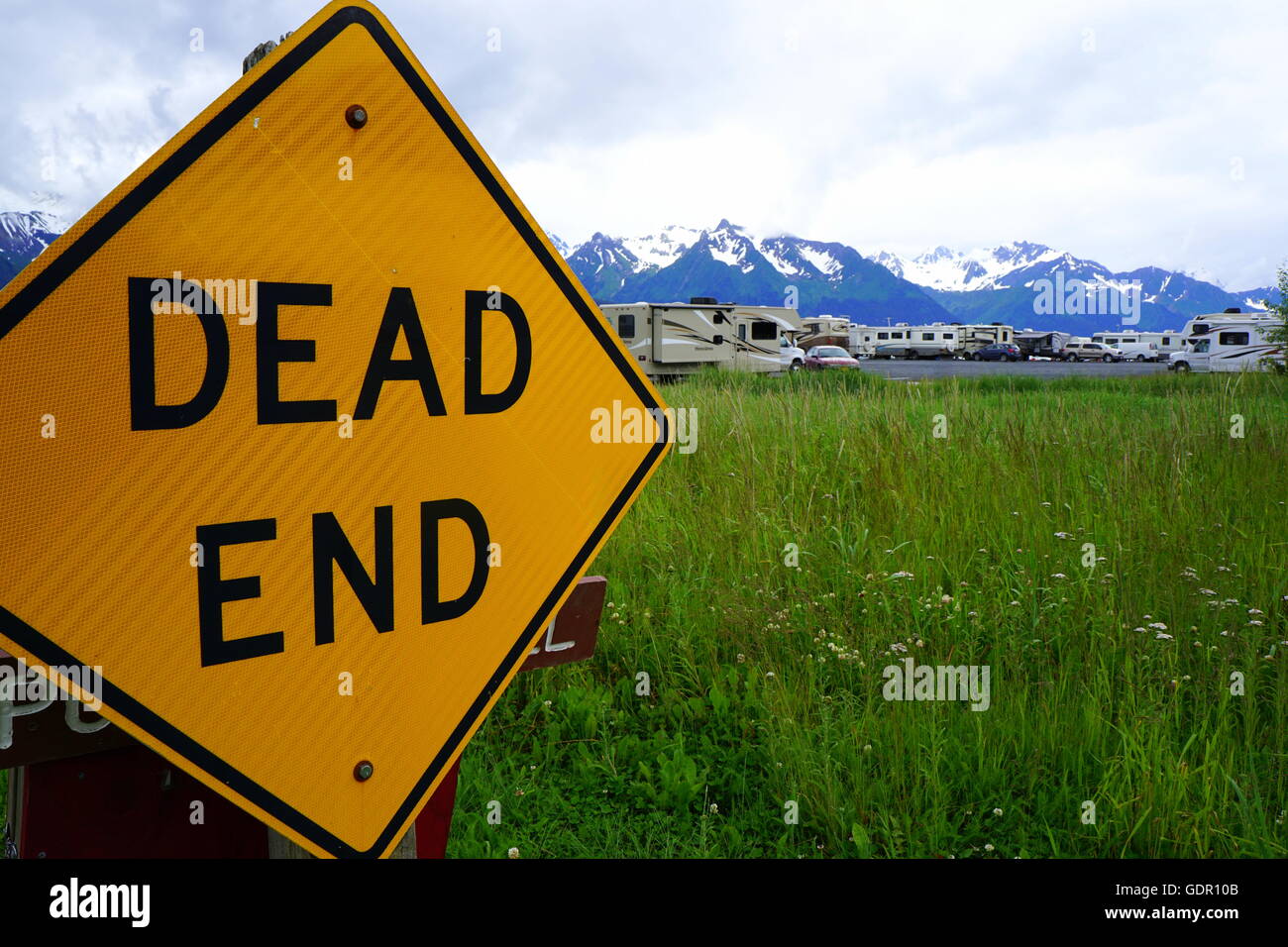 A 'Dead End' sign in front of the RV Campground along Resurrection Bay in Seward, Alaska Stock Photo