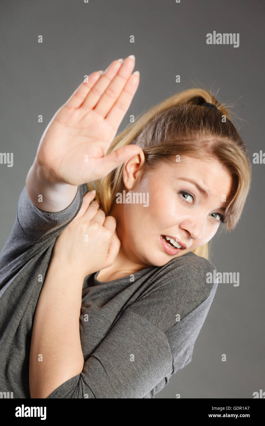 Fear and scare. Violence against woman. Concept of threating young ...