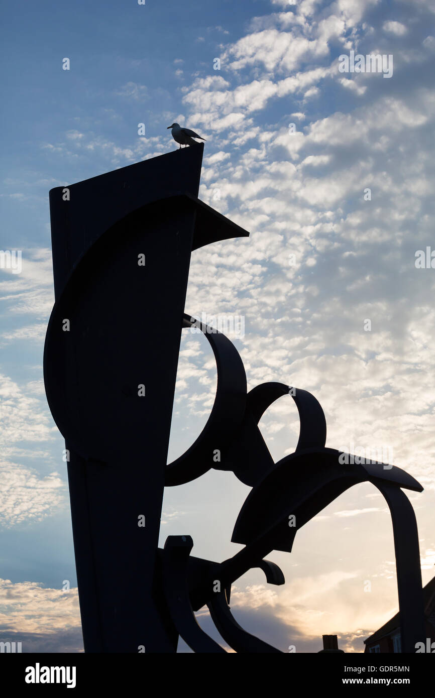 Sea Music sculpture by Sir Anthony Caro silhouetted against interesting ...