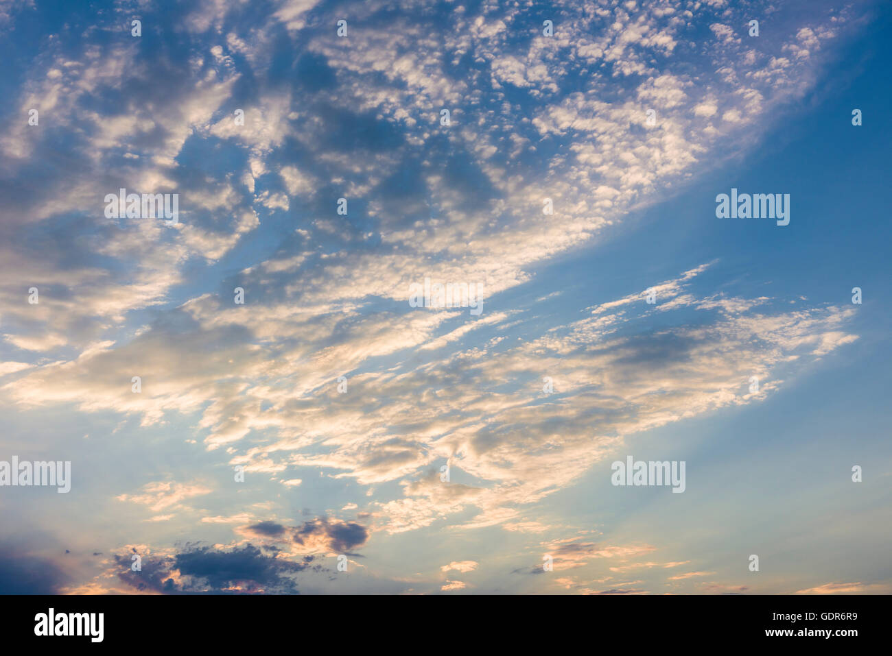Altocumulus Clouds in a blue sky Stock Photo - Alamy