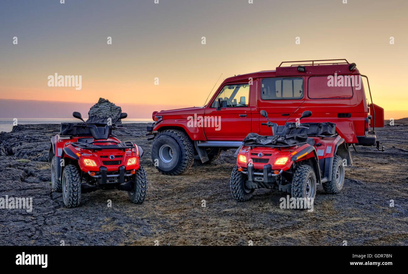 Four-wheelers and SUV on lava rock, Reykjanes Peninsula, Iceland Stock Photo