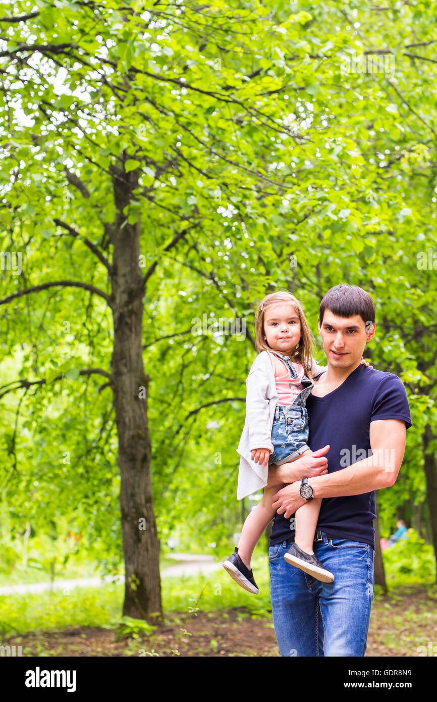 Happy father with daughter in summer park Stock Photo - Alamy
