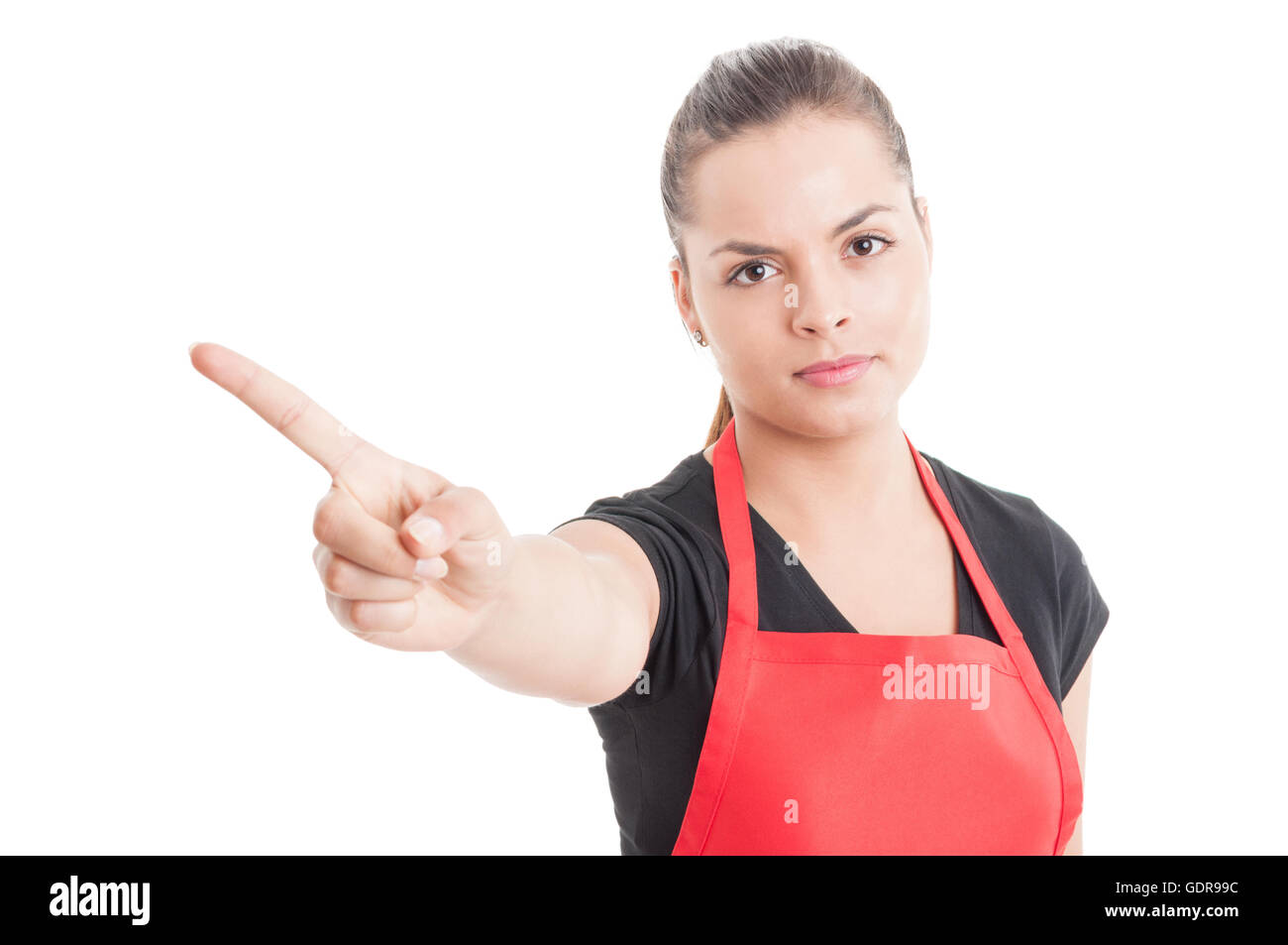 Supermarket employee with red apron doing a refusal gesture with hand
