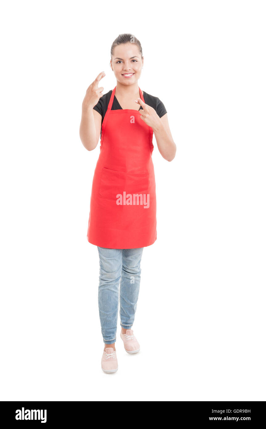 Full body of pretty hypermarket employee doing double luck gesture isolated on white background Stock Photo