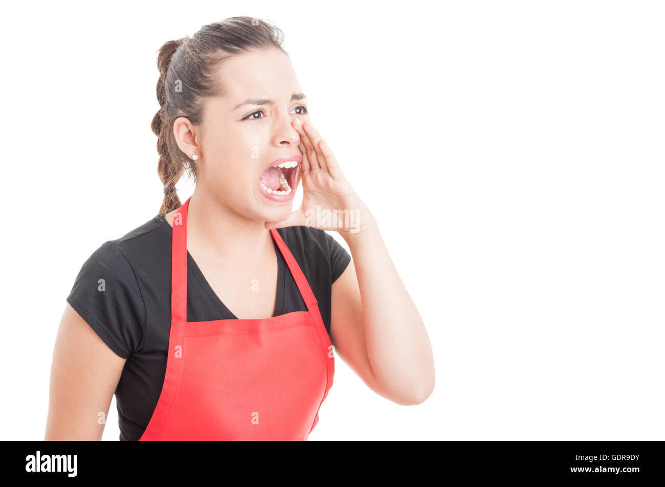 Female employee on supermarket shouting out loud at somebody isolated on white background with copy space Stock Photo