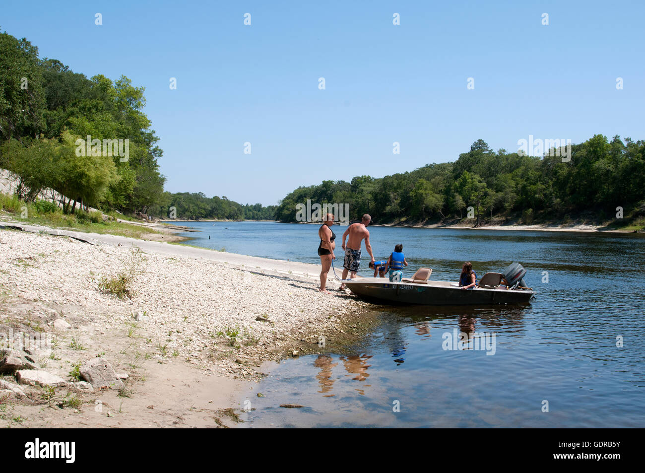 Family boating on the Swannee River in Florida USA Stock Photo