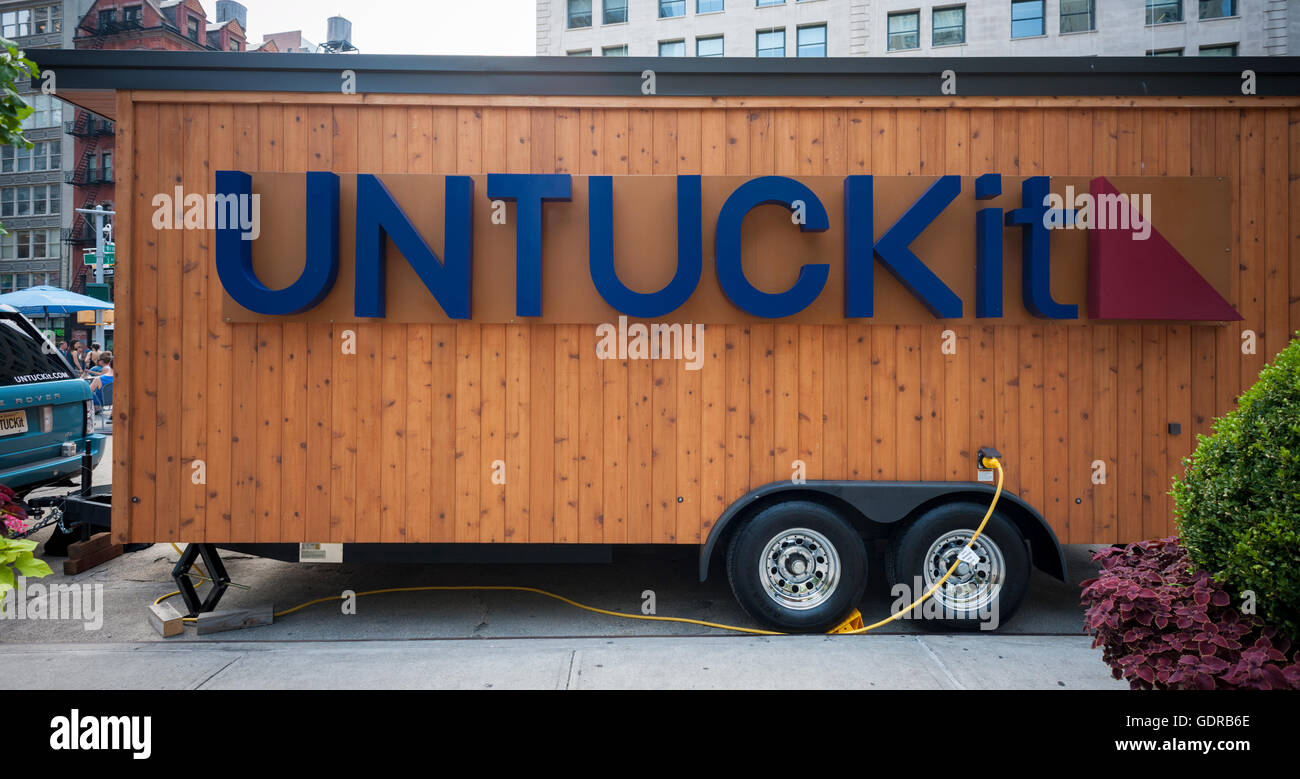 The men's apparel company Untuckit holds a branding event in Flatiron Plaza in New York on Saturday, July 16, 2016. Untuckit sells shirts through its website and several brick and mortar locations that are meant to be worn untucked. (© Richard B. Levine) Stock Photo