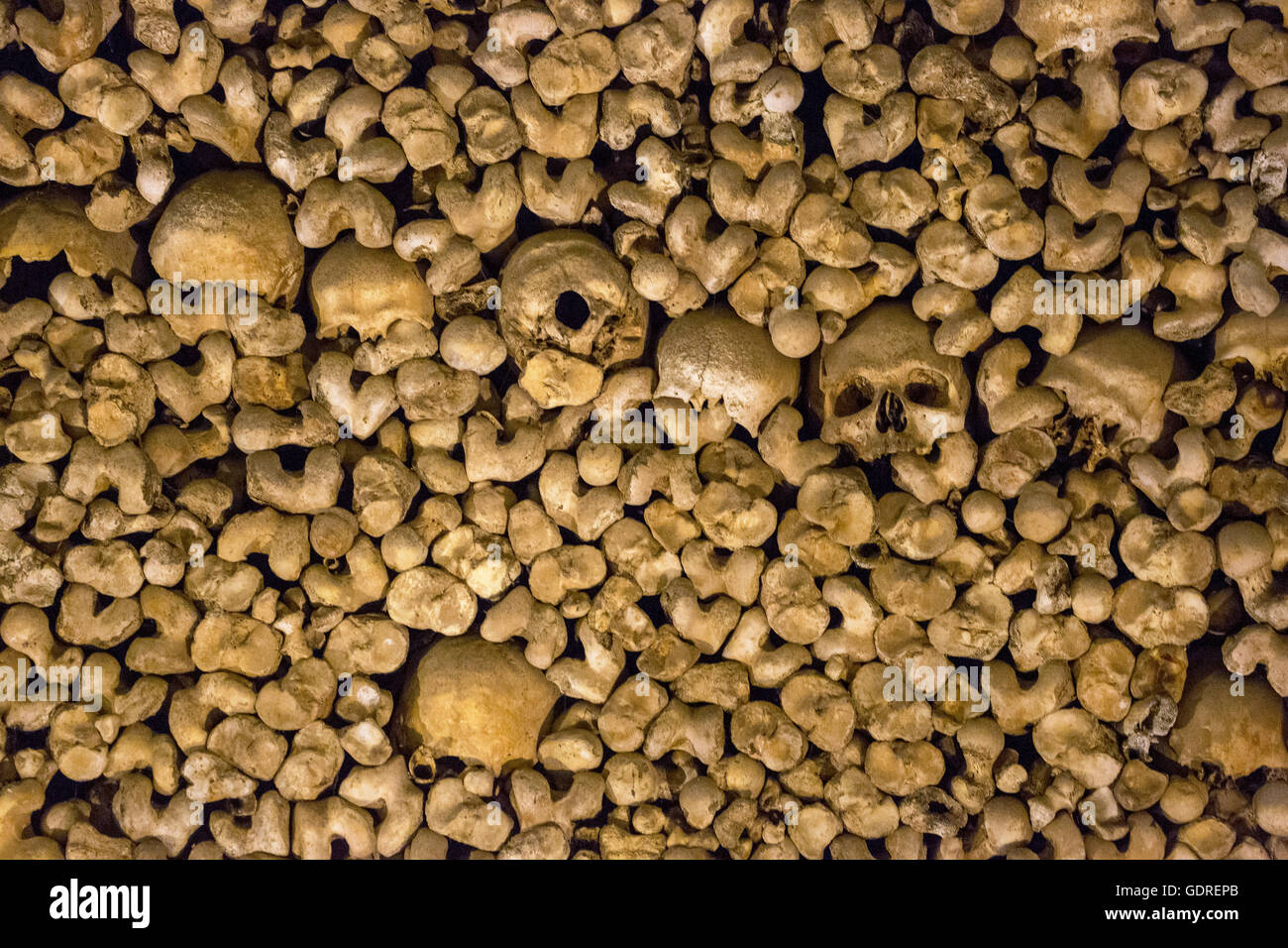 piled bones in the ossuary, Capela dos ossos parede, chapel of bones, bone chapel, ossuary in Évora, Évora District, Portugal, Stock Photo
