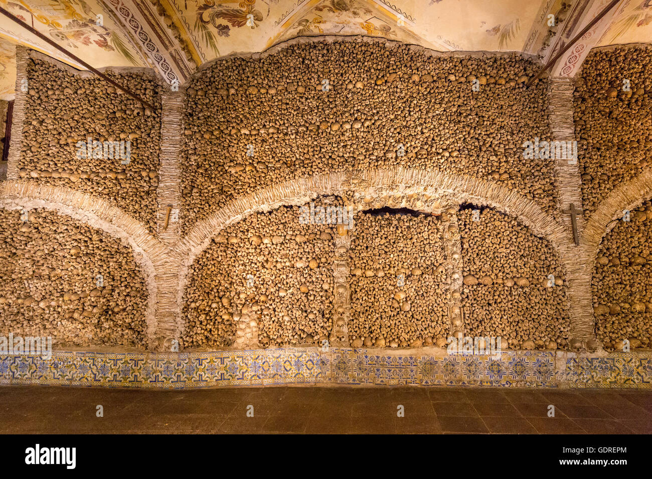 piled bones in the ossuary, Capela dos ossos parede, chapel of bones, bone chapel, ossuary in Évora, Évora District, Portugal, Stock Photo