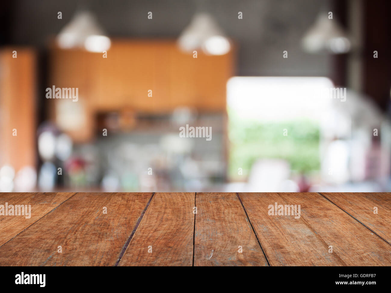Tabletop with abstract blur coffee shop background, stock photo Stock
