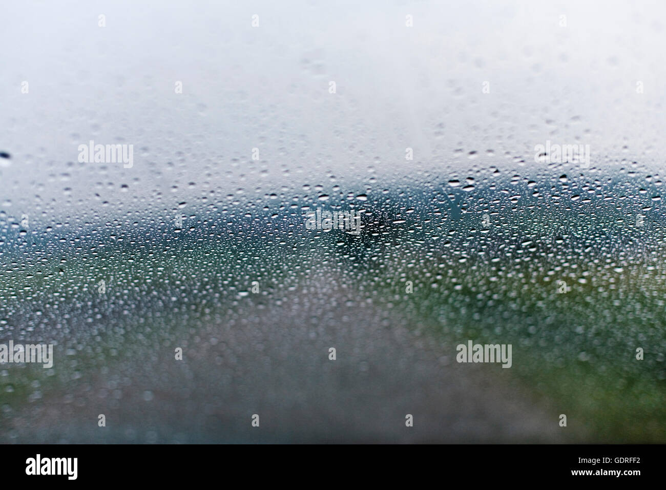 Raindrops on a car window Stock Photo