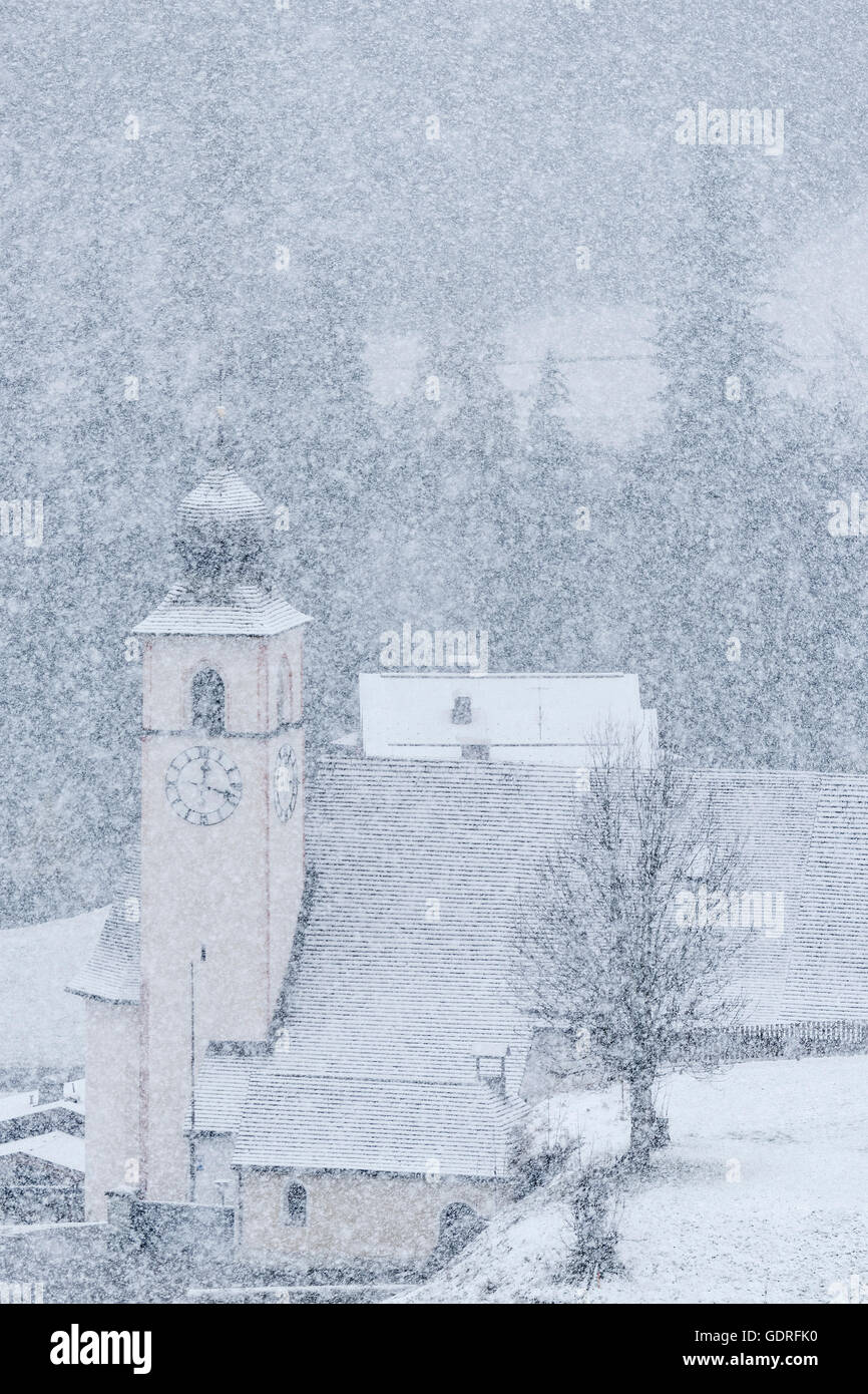 Church in snow storm, Prägraten am Großvenediger, Virgental, East Tyrol, Austria Stock Photo